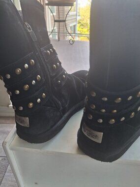 Black sheepskin uggs with studded grommets